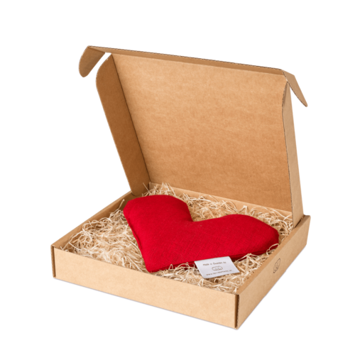 Röd sweetheart vetevärmare i förpackning